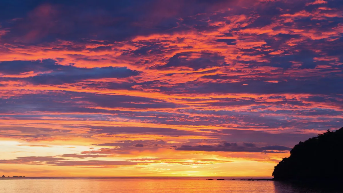 Fiery sky at sunset over the sea, Madagascar — Nicolas Marincic