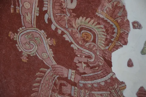 Detail of a pre-Hispanic mural on a red ground, Mexico — Nicolas Marincic