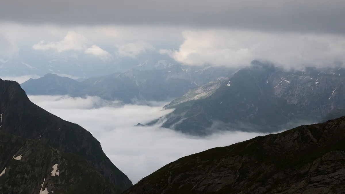 Sea of clouds filling a Pyrenean valley, France — Nicolas Marincic
