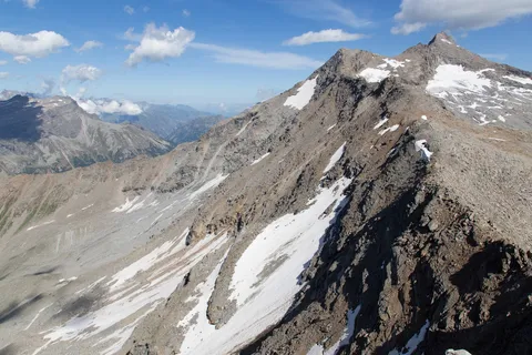 Rocky summit with patches of snow — Nicolas Marincic
