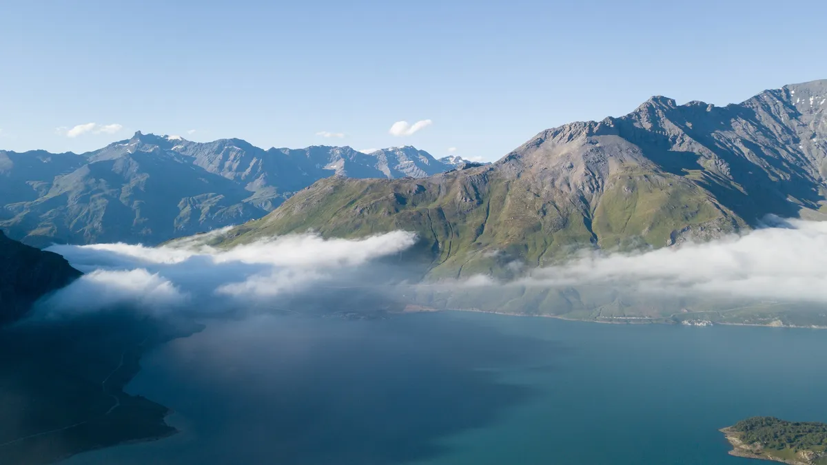 Lake and sea of clouds, Mont-Cenis, France — Nicolas Marincic