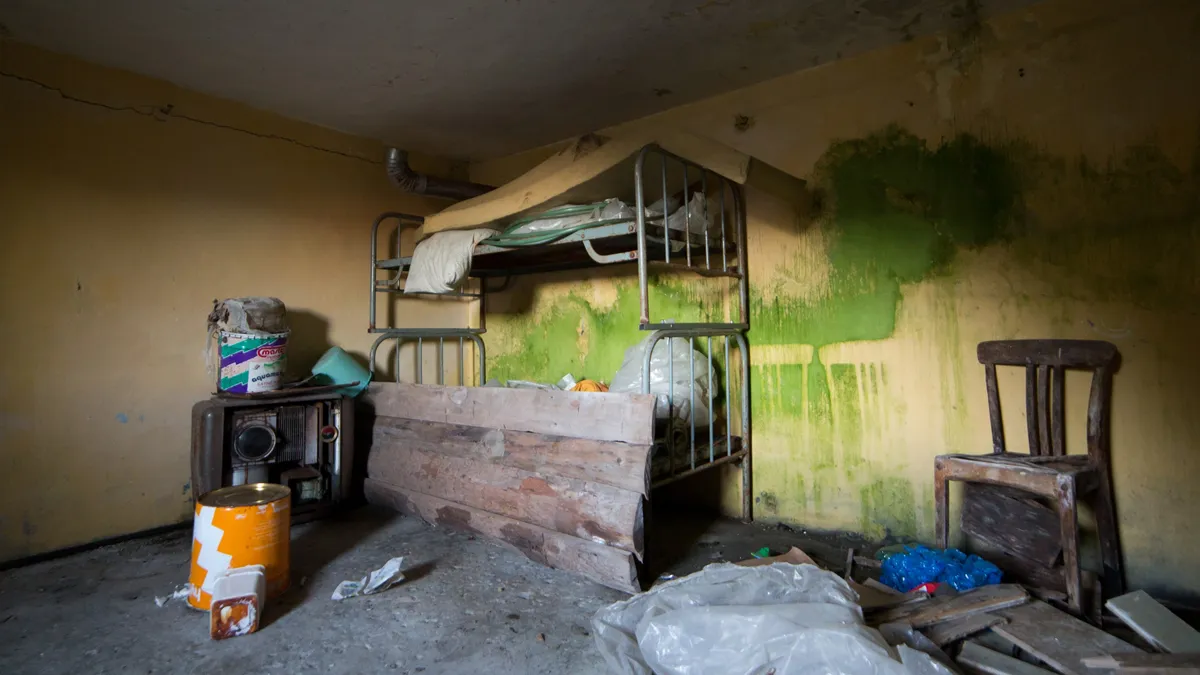 Barracks room with peeling green walls, Mont-Cenis, France — Nicolas Marincic