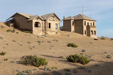 Sand-swamped houses of Kolmanskop, Namibia — Nicolas Marincic