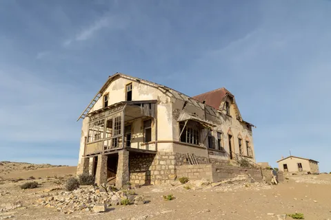House collapsing into the dunes, Kolmanskop, Namibia — Nicolas Marincic