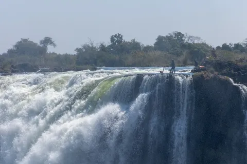 The brink of Victoria Falls, Zimbabwe — Nicolas Marincic