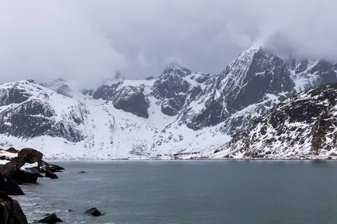Snowy cirque above the fjord, Lofoten, Norway — Nicolas Marincic