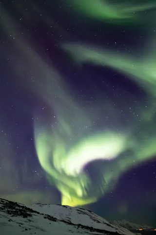 Aurore boréale en volutes, Norvège — Nicolas Marincic