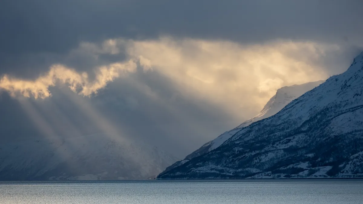 Sunbeams over the fjord, Norway — Nicolas Marincic