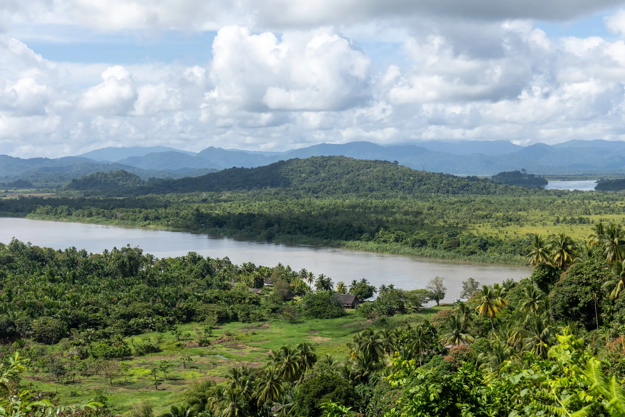 River winding through forested hills, Papua — Nicolas Marincic