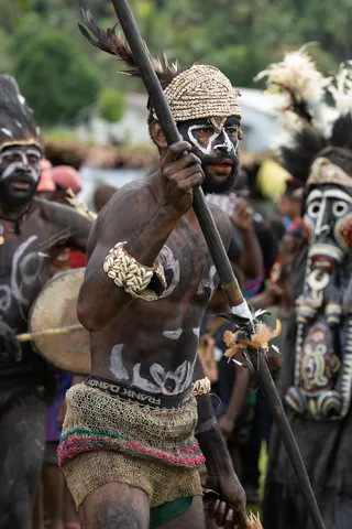 Masked dancer with spear, Ambunti Crocodile Festival, Papua — Nicolas Marincic