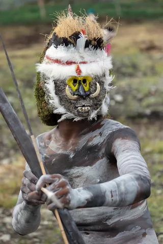 Warrior with a white feather mask, Papua — Nicolas Marincic