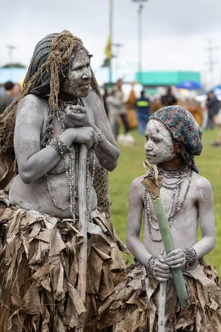 Clay-covered woman and child, Mount Hagen Show, Papua — Nicolas Marincic