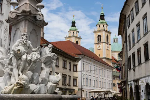 Robba Fountain and cathedral towers, Ljubljana, Slovenia — Nicolas Marincic