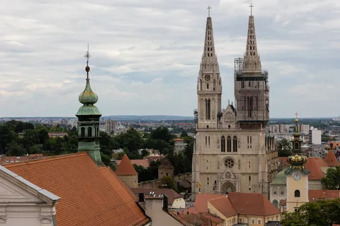 Cathedral spires over the rooftops of Zagreb, Croatia — Nicolas Marincic