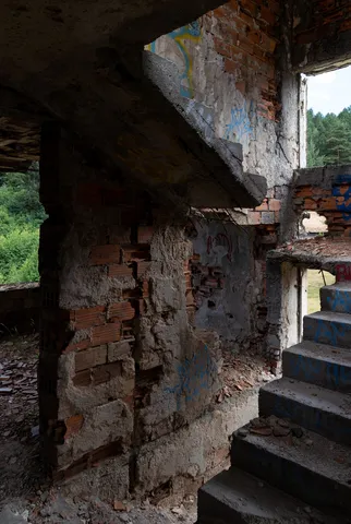 Interior staircase of a ruined hotel, Trebević, Bosnia and Herzegovina — Nicolas Marincic