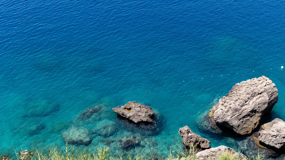 Rocks in turquoise water, Turkey — Nicolas Marincic
