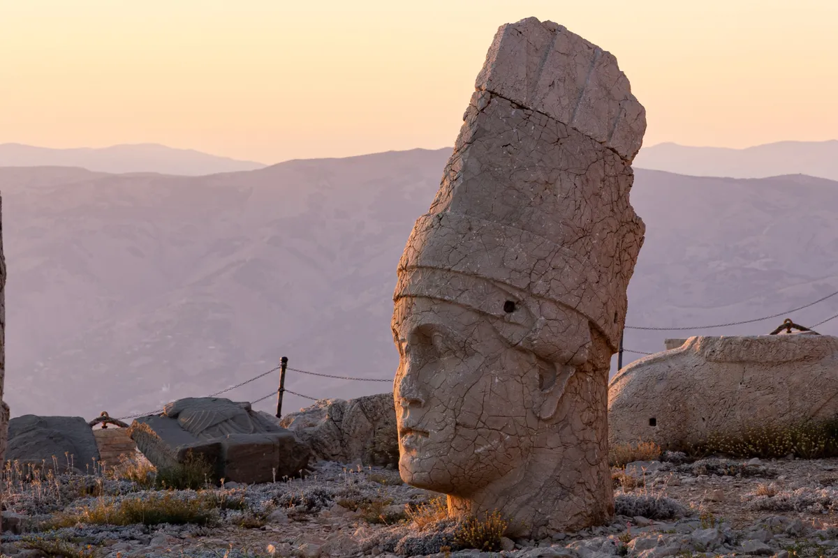 Stone head in warm sunset light, Mount Nemrut, Turkey — Nicolas Marincic