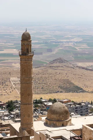 Ulu Camii minaret above the Mesopotamian plain, Mardin, Turkey — Nicolas Marincic