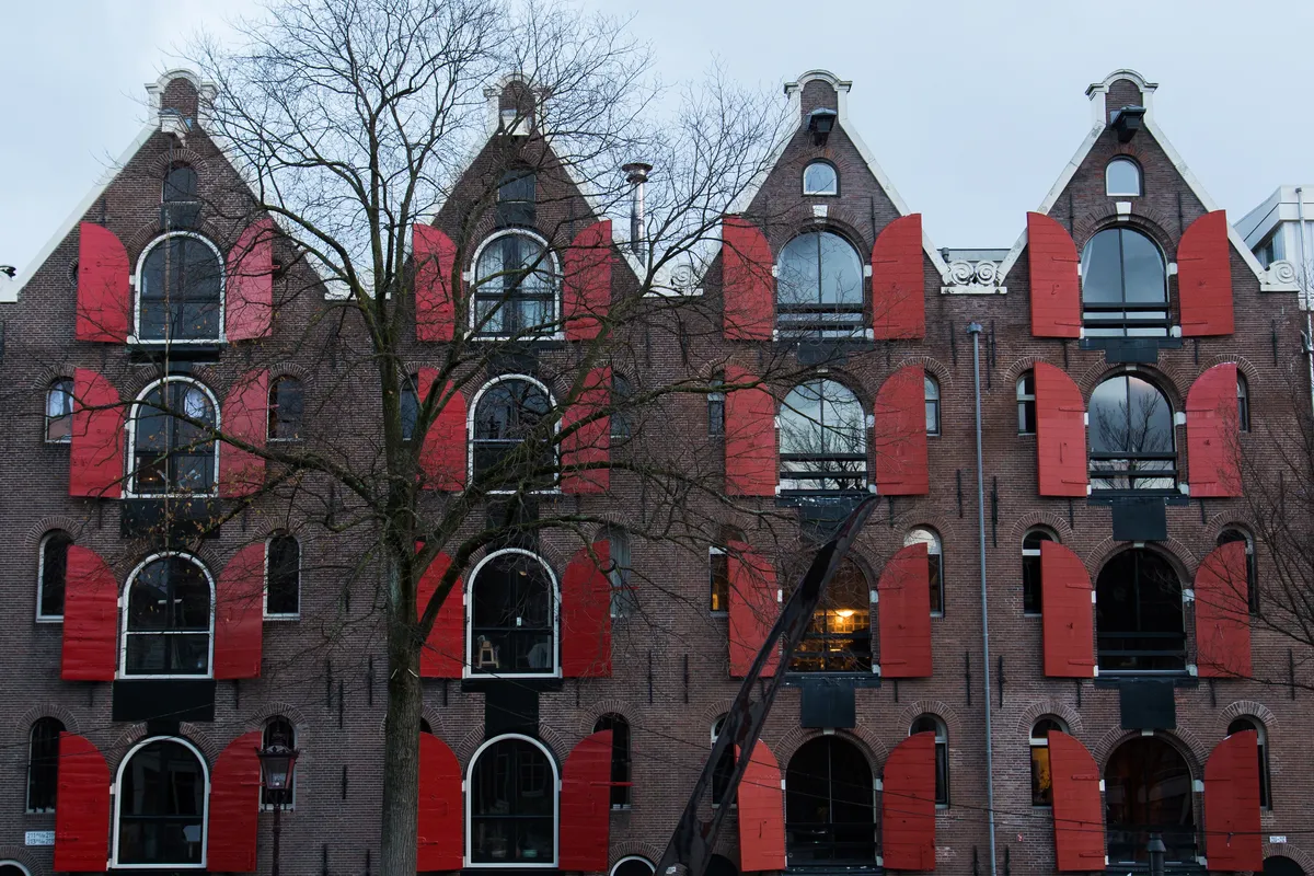 Warehouses with red shutters and bell gables, Amsterdam, Netherlands — Nicolas Marincic
