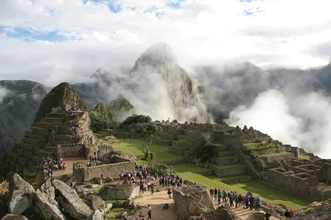 Machu Picchu with clouds on Huayna Picchu, Peru — Nicolas Marincic