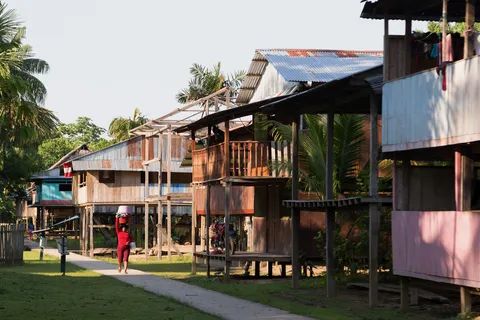 Wooden stilt houses in the Amazon, Peru — Nicolas Marincic