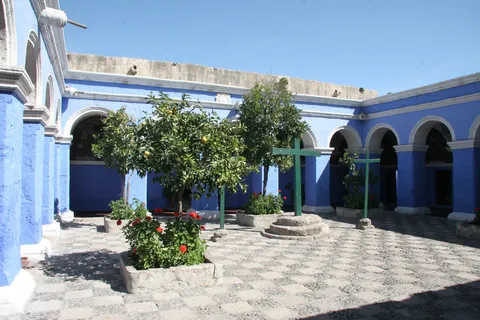 Blue Cloister of the Orange Trees with green crosses, Santa Catalina, Peru — Nicolas Marincic