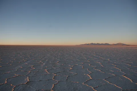 Salt hexagons at sunrise, Salar de Uyuni, Bolivia — Nicolas Marincic