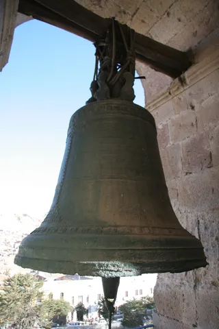 Cathedral bell framing the city of Potosí, Bolivia — Nicolas Marincic