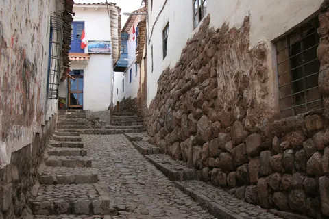 Inca wall along a cobbled alley, Cusco, Peru — Nicolas Marincic