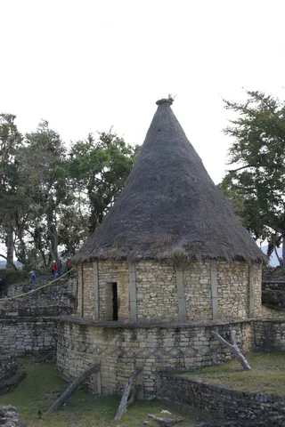 Reconstructed thatched round house, Kuélap, Peru — Nicolas Marincic