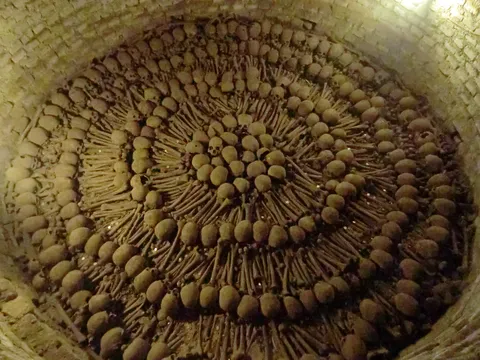 Circle of skulls and bones, San Francisco catacombs, Peru — Nicolas Marincic