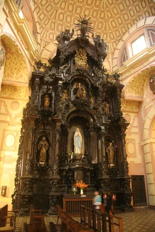 Carved wooden retablo of La Merced, Lima, Peru — Nicolas Marincic