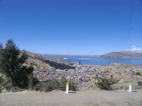 Puno and Lake Titicaca from above, Peru — Nicolas Marincic