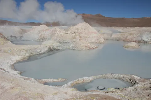 Turquoise mud pools and steam, Sol de Mañana, Bolivia — Nicolas Marincic