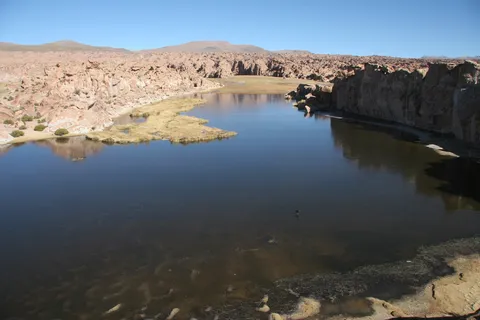 Still water and rock walls, Laguna Negra, Bolivia — Nicolas Marincic