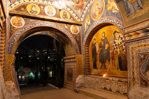 Painted archway and mosaics at night, Bucharest, Romania — Nicolas Marincic