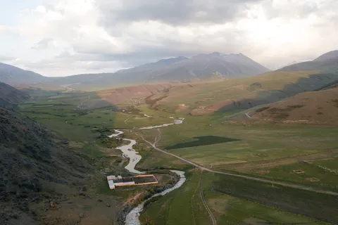 Winding river in a green valley south of Issyk-Kul, Kyrgyzstan — Nicolas Marincic