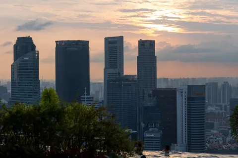 Downtown skyline at sunset from a rooftop, Singapore — Nicolas Marincic