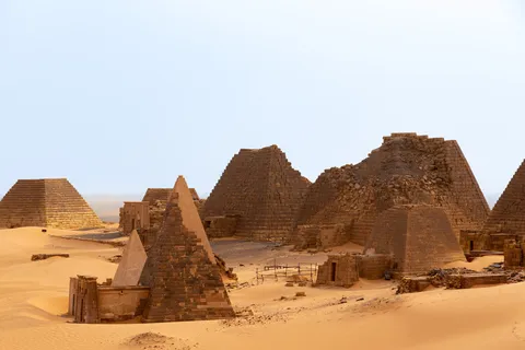 Pyramids and dunes of the royal cemetery of Meroë, Sudan — Nicolas Marincic