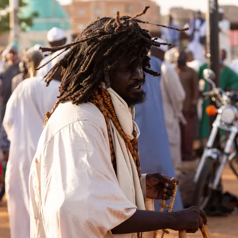 Dervish with dreadlocks and prayer beads, Omdurman, Sudan — Nicolas Marincic