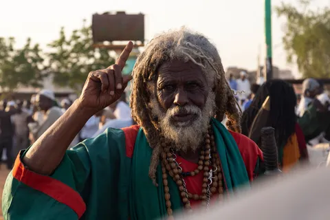 White-bearded dervish raising a finger, Omdurman, Sudan — Nicolas Marincic