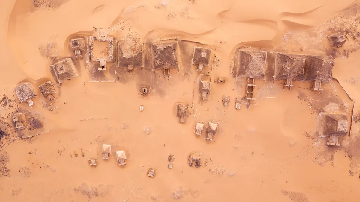 Aerial view of a sand-swept village, Sudan — Nicolas Marincic