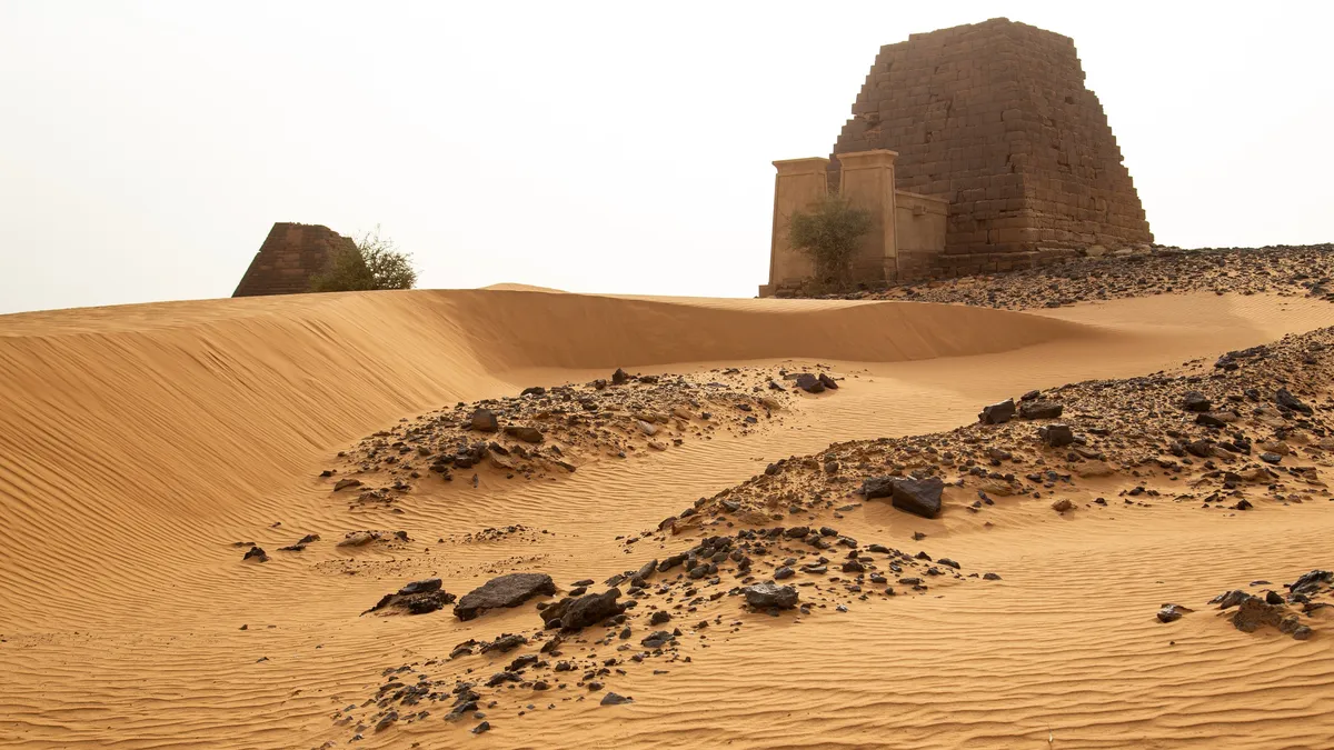 Nubian pyramid above the dunes, Sudan — Nicolas Marincic