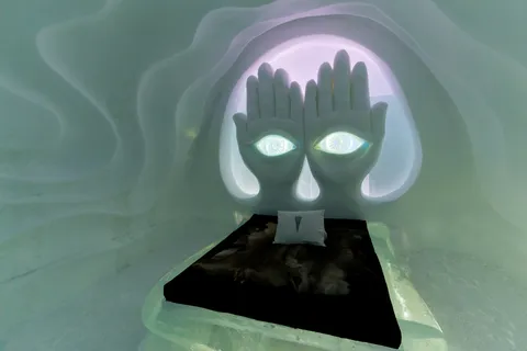 Glowing hands in an art suite, Icehotel, Sweden — Nicolas Marincic