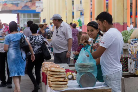 Bread sellers at the bazaar, Tajikistan — Nicolas Marincic