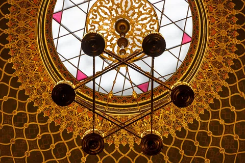 Gilded dome and Star of David chandelier, Spanish Synagogue, Prague, Czechia — Nicolas Marincic
