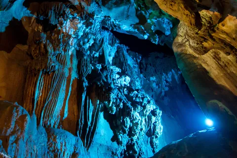 Blue-lit formations, Chiang Dao cave, Thailand — Nicolas Marincic