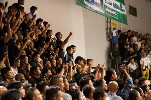Crowd betting at a Muay Thai fight, Bangkok, Thailand — Nicolas Marincic