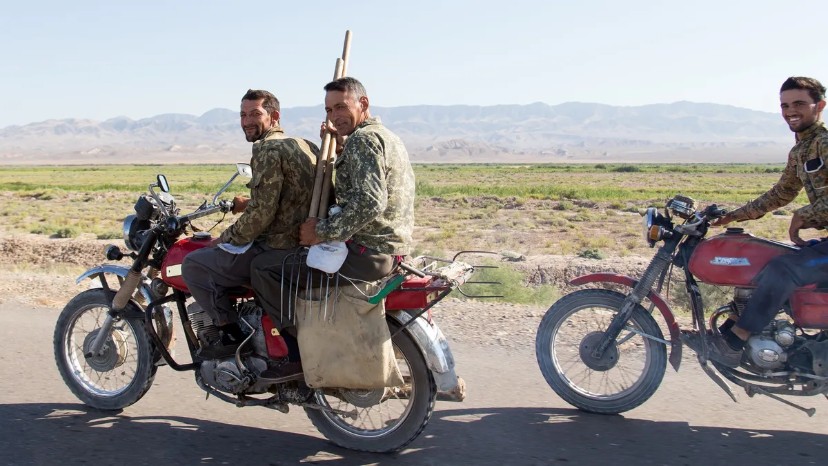 Motorcyclists on the steppe, Turkmenistan — Nicolas Marincic