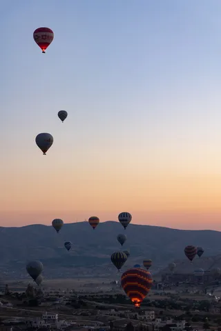 Hot-air balloons over Cappadocia at dawn, Turkey — Nicolas Marincic